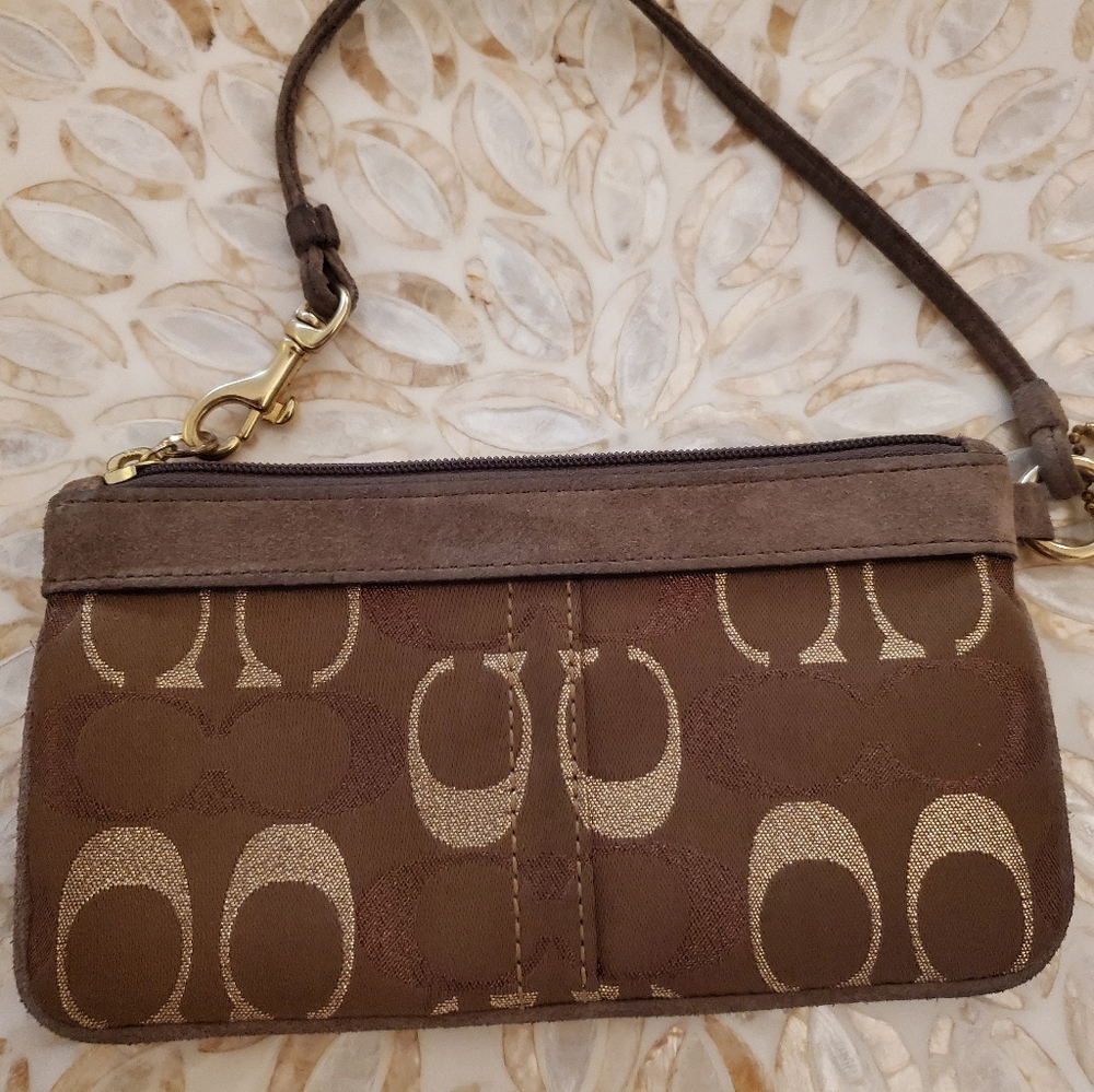 Coach brown metallic wristlet
